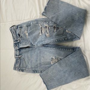 Light acid wash distressed jeans